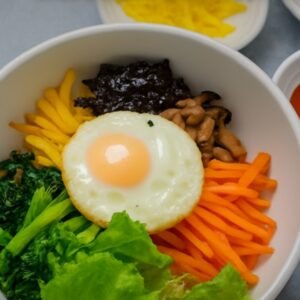 No(37)비빔밥 Bibimbap [br] Korean rice bowl topped with assorted vegetables, egg and spicy gochujang sauce.Beef Bibimbap,Chicken Bibimbap,Pork Bibimbap