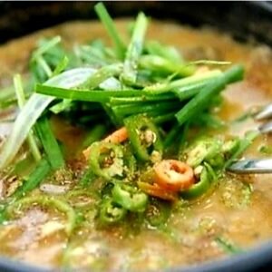 No(49)Chueotang 추어탕 [br] Authentic Korean loach soup, slow-cooked in deep, savory soybean paste broth with aromatic herbs and vegetables for a rich, comforting taste.